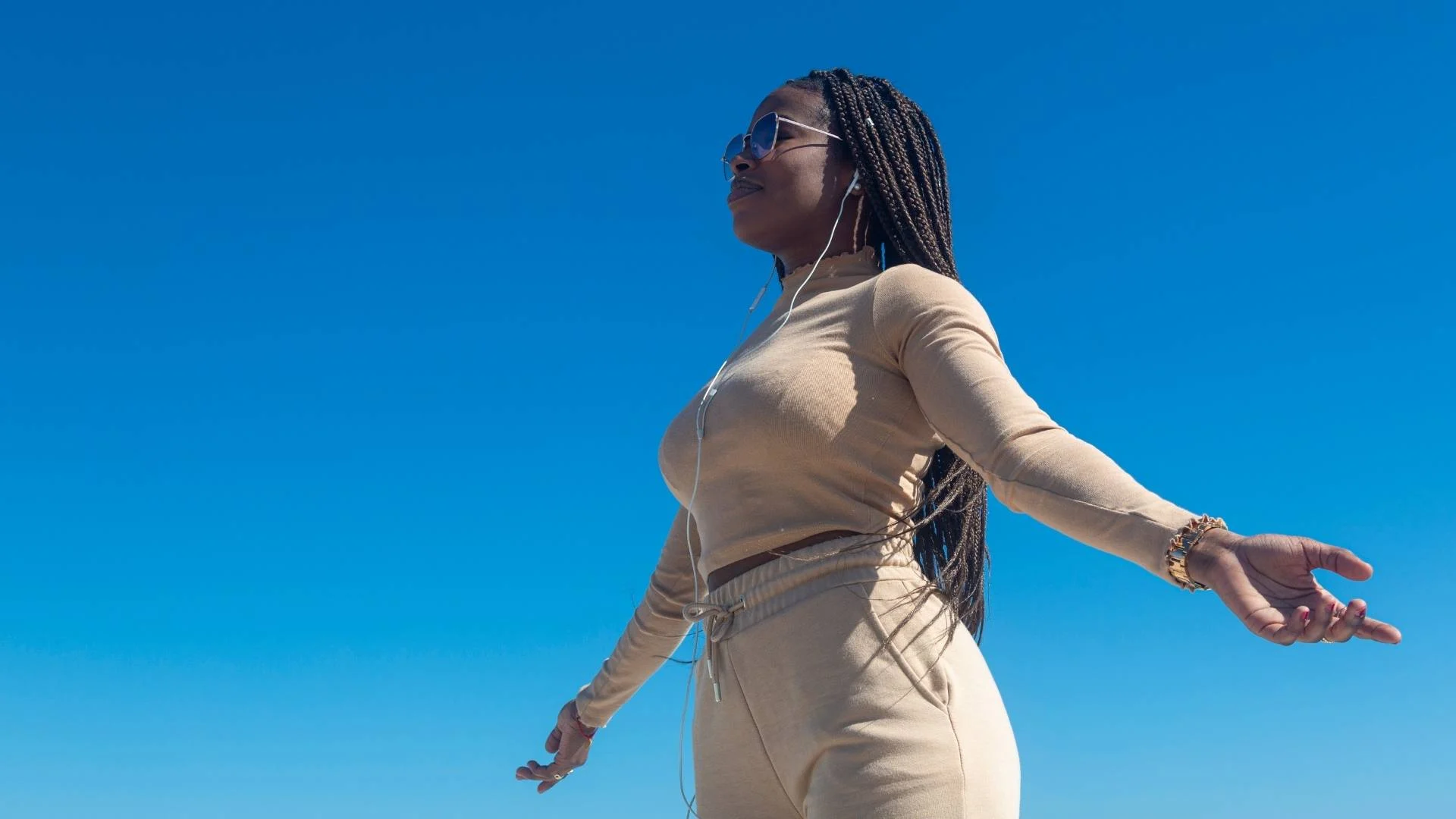 Confident young woman standing strong and composed, symbolizing empowerment through emotional self-control and withheld anger