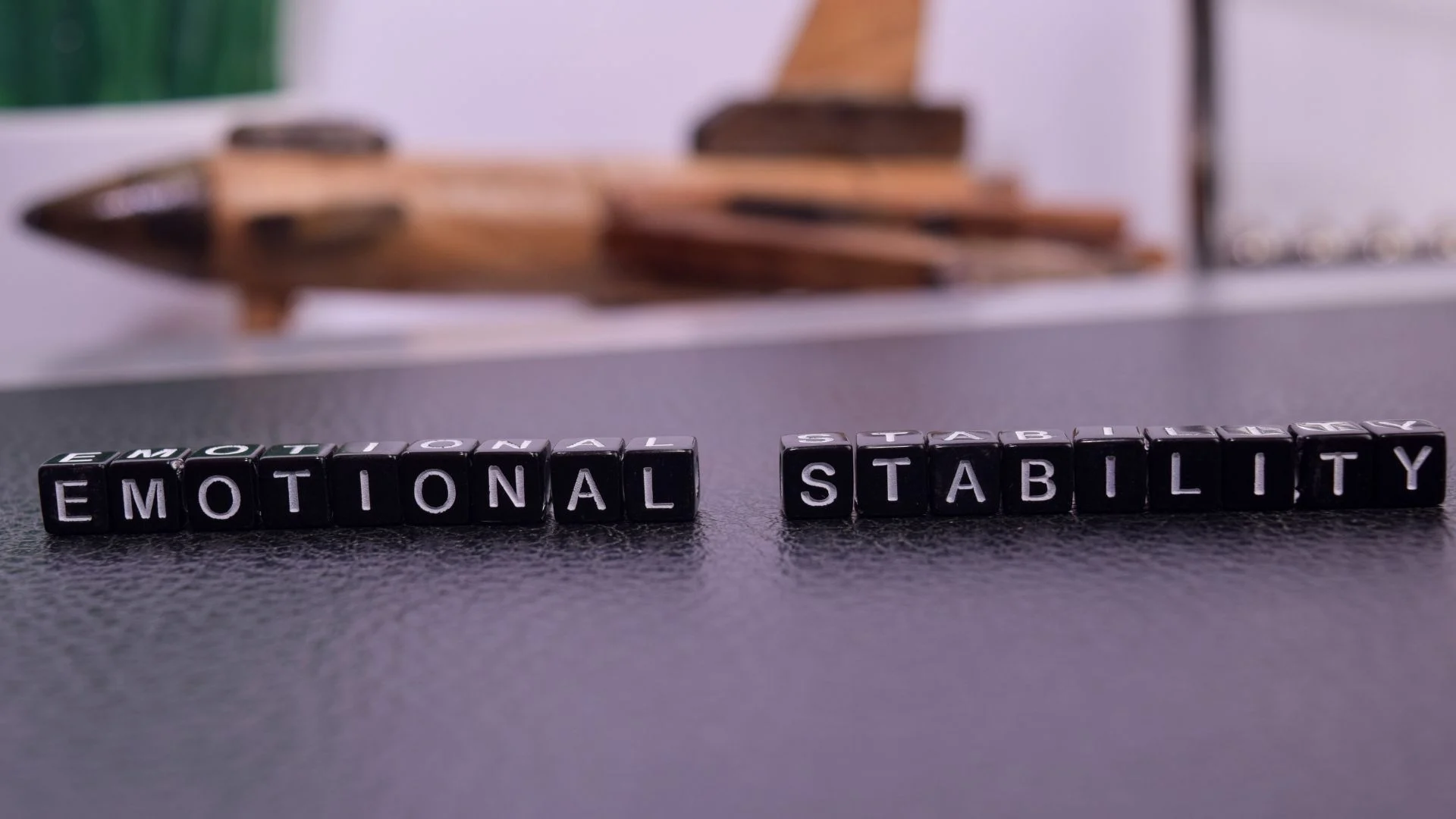 Emotional stability leadership and women leadership mindset reflected through a calm and confident woman leader in a professional setting