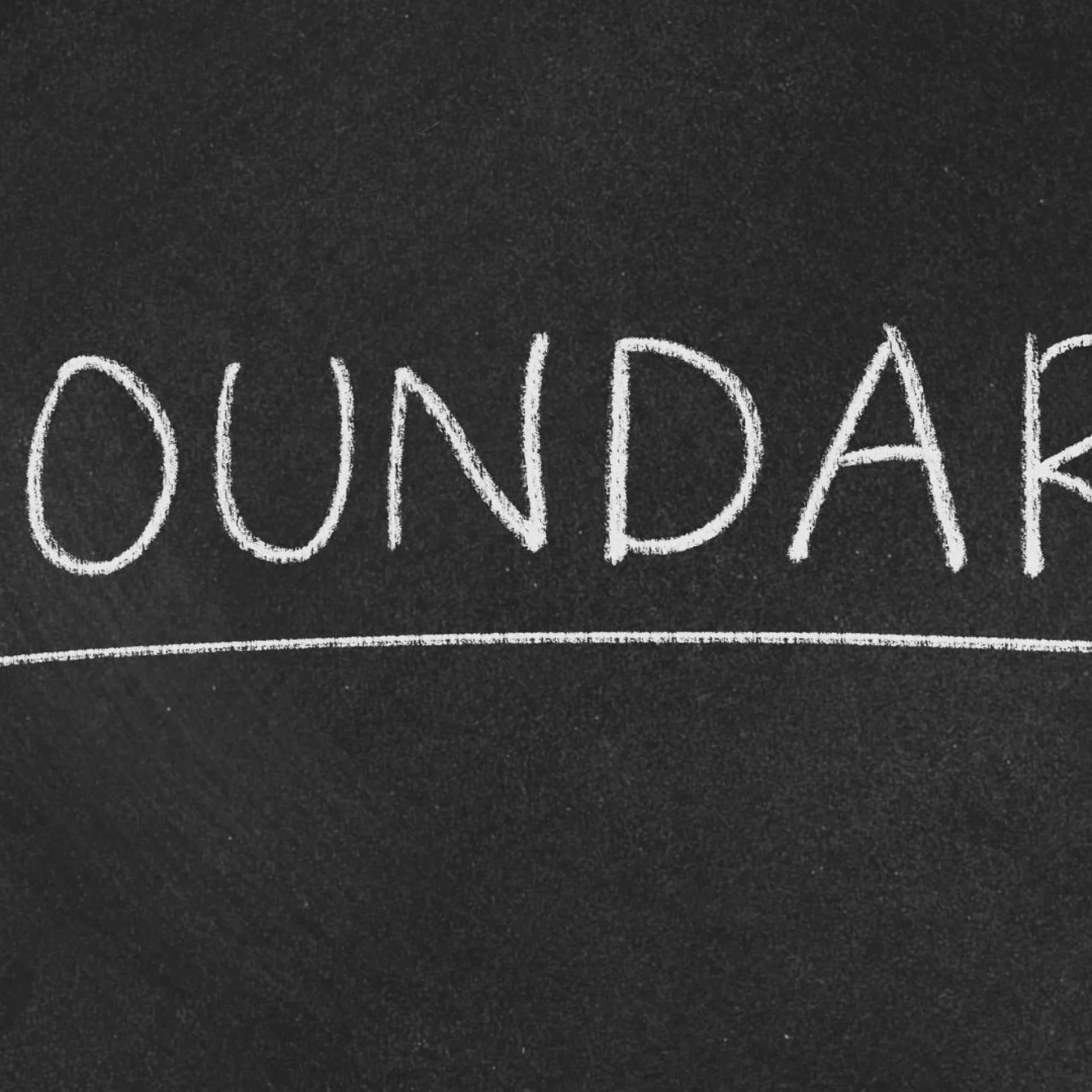 Women leaders boundaries and saying no leadership reflected through a confident professional woman setting clear leadership boundaries in the workplace