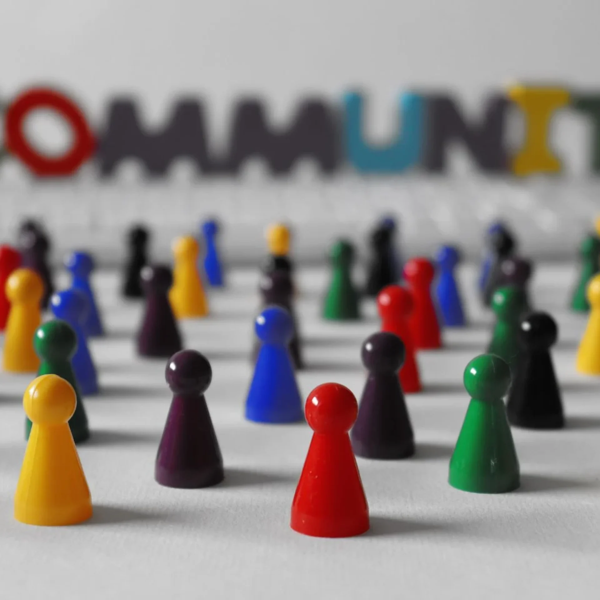 Colorful figures representing a women leadership community and collective leadership development growth